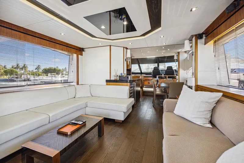 Slide: The Image of Luxurious interior of 2014 Sunseeker 73 Manhattan yacht with modern furnishings and panoramic windows. - 13