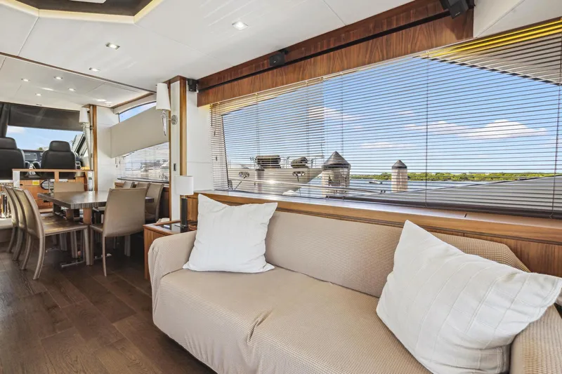 Slide: The Image of Luxurious interior of 2014 Sunseeker 73 Manhattan yacht with elegant seating and dining area. - 14