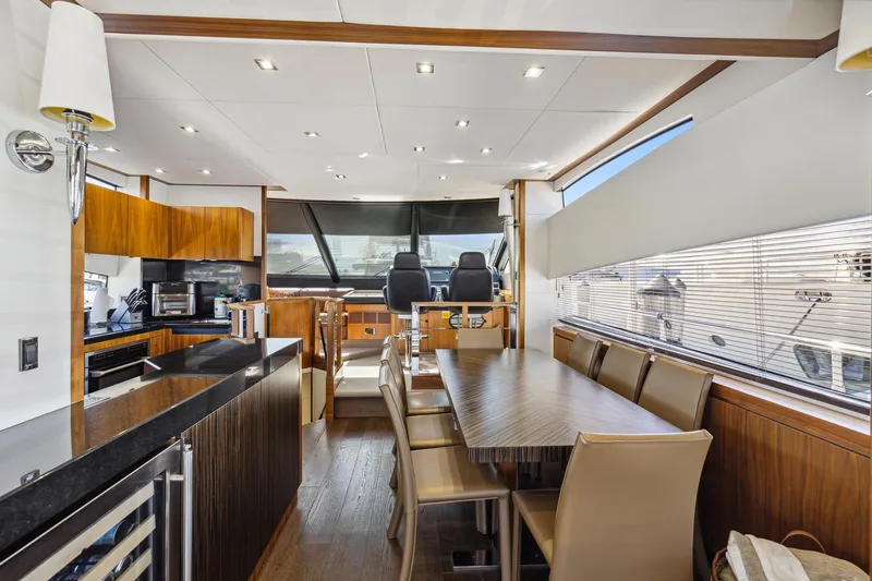 Slide: The Image of Luxurious interior of 2014 Sunseeker 73 Manhattan yacht with modern dining and kitchen area. - 16
