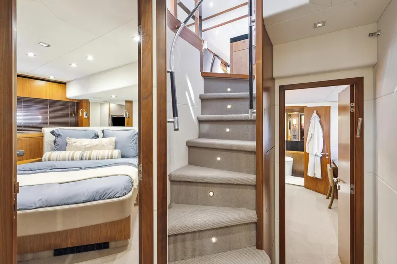 Slide: The Image of Luxurious interior of 2014 Sunseeker 73 Manhattan yacht with elegant bedroom and staircase. - 25