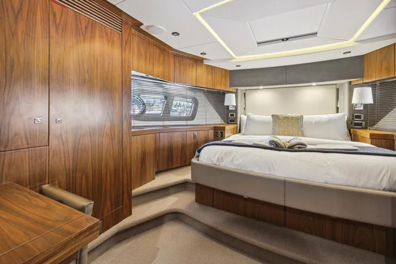 Slide: The Image of Luxurious bedroom interior of 2014 Sunseeker 73 Manhattan yacht with elegant wood finishes. - 35