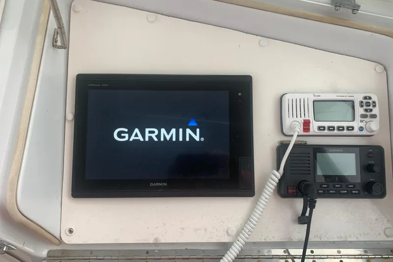 Slide: The Image of Garmin navigation system on 1999 Hatteras 52 Cockpit Motor Yacht dashboard. - 12
