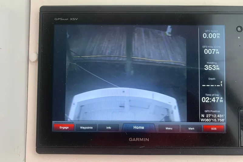 Slide: The Image of Garmin GPS display on 1999 Hatteras 52 Cockpit Motor Yacht, showing navigation data. - 14