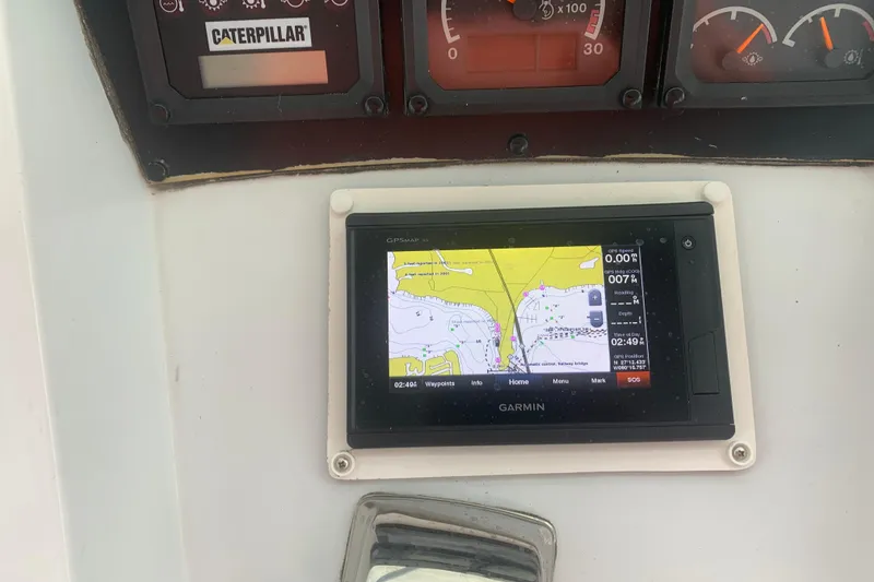 Slide: The Image of Garmin GPS display on 1999 Hatteras 52 Cockpit Motor Yacht dashboard. - 8