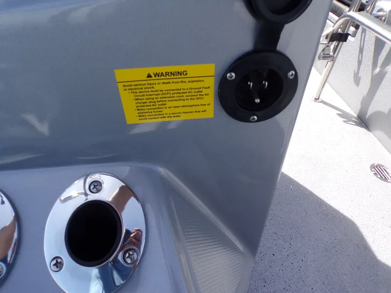 Slide: The Image of Warning label on Xpress H22B Bay boat, model 2026. - 15