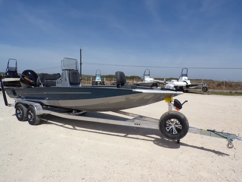 Slide: The Image of 2026 Xpress H22B Bay boat on trailer outdoors. - 19