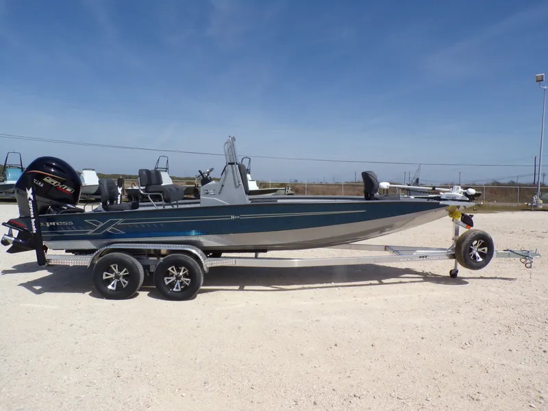 Slide: The Image of 2026 Xpress H22B Bay boat on trailer outdoors. - 20