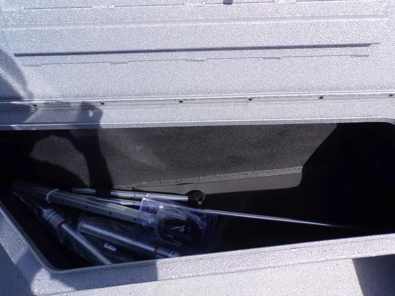 Slide: The Image of Storage compartment in Xpress H22B Bay boat, 2026 model. - 28