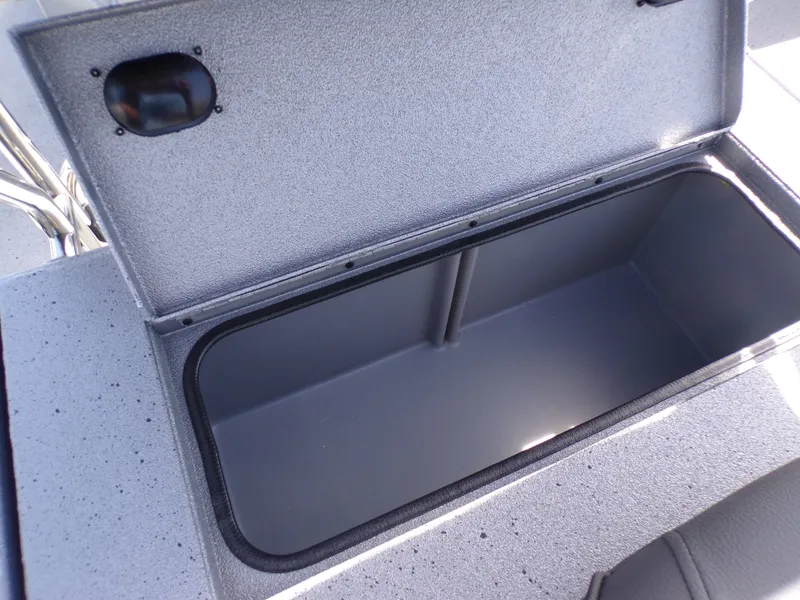 Slide: The Image of Open storage compartment in 2026 Xpress H22B Bay boat. - 30