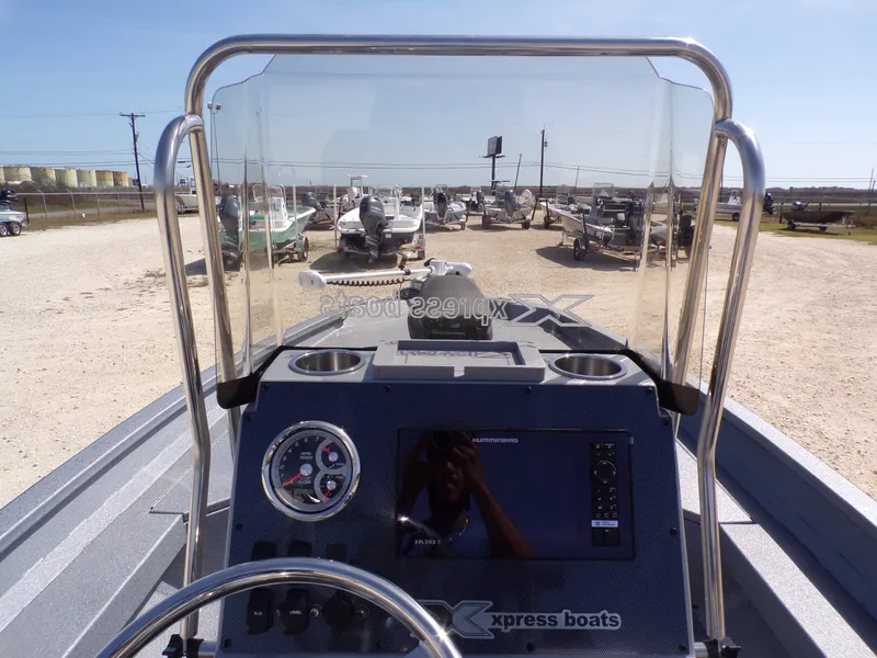 Slide: The Image of 2026 Xpress H22B Bay boat cockpit view outdoors. - 32