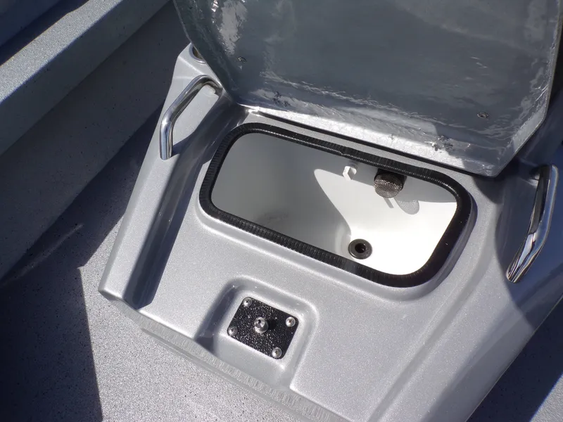Slide: The Image of Open storage compartment in 2026 Xpress H22B Bay boat. - 8