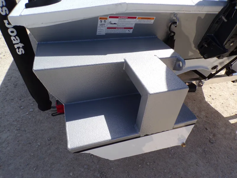 Slide: The Image of Xpress SW20B 2026 boat hull with warning labels. - 14