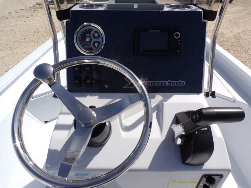 Slide: The Image of Steering console of Xpress SW20B boat, model year 2026. - 29
