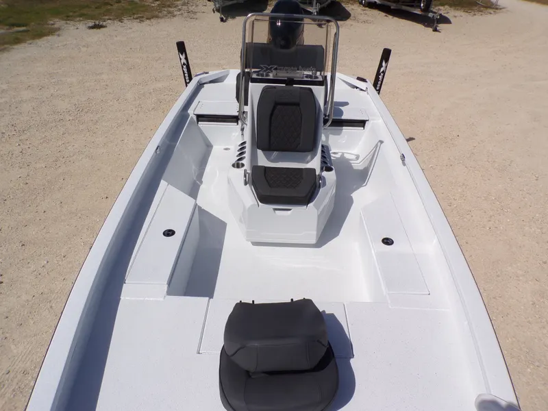 Slide: The Image of 2026 Xpress SW20B boat with modern design and seating arrangement. - 3