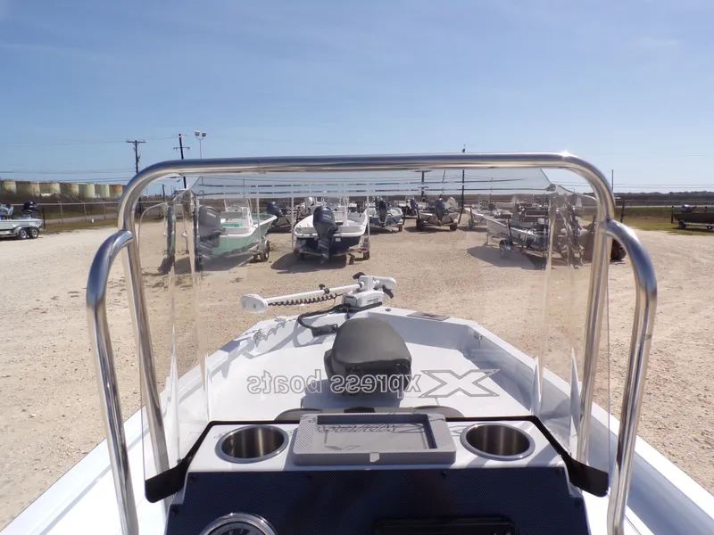 Slide: The Image of Xpress SW20B 2026 boat parked outdoors on a sunny day. - 30