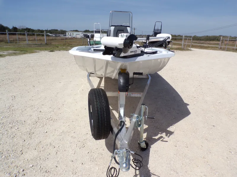 Slide: The Image of 2026 Xpress SW20B boat on trailer, front view. - 8