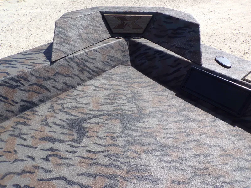 Slide: The Image of 2026 Xpress X18DB boat with camouflage pattern design. - 20