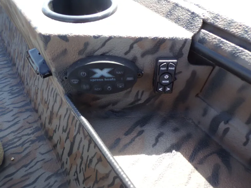 Slide: The Image of Control panel of Xpress X18DB boat, model 2026. - 28