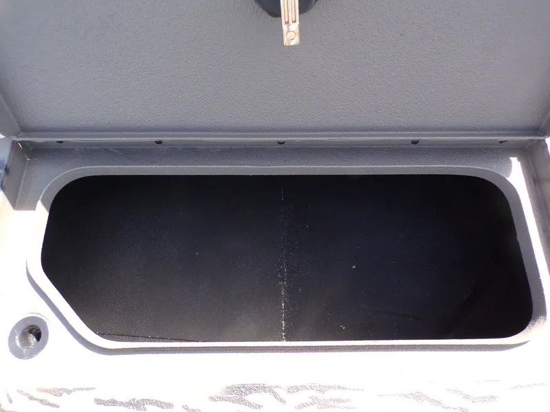 Slide: The Image of Open storage compartment in Xpress X18DB boat, year 2026. - 7