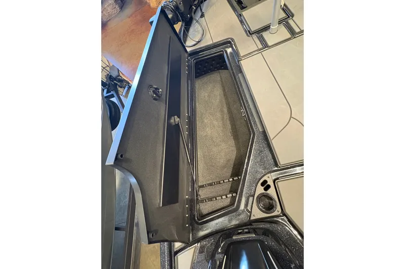 Slide: The Image of Open storage compartment in 2026 Nitro Z19 XL boat, showcasing interior design and functionality. - 14