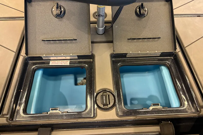 Slide: The Image of Open storage compartments on a 2026 Nitro Z19 XL boat deck. - 20