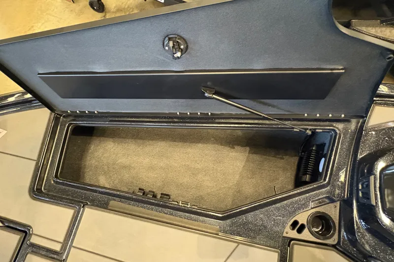 Slide: The Image of Open storage compartment in 2026 Nitro Z19 XL boat, showcasing interior space and design. - 13