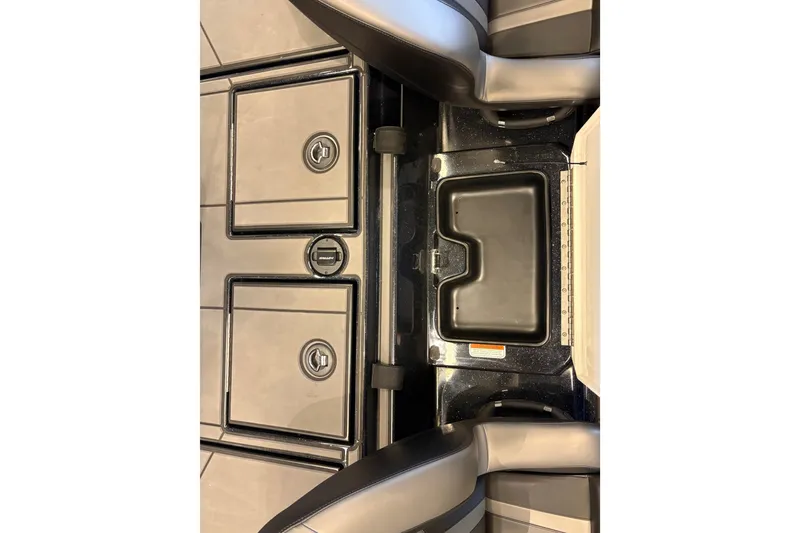 Slide: The Image of Interior view of 2026 Nitro Z19 XL boat storage compartments and seating. - 18