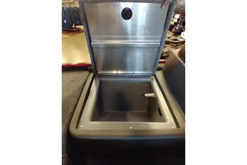 Slide: The Image of Open storage compartment in 2026 Tracker Bass Tracker Classic XL boat. - 10