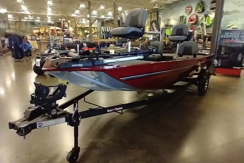 Slide: The Image of 2026 Tracker Bass Tracker Classic XL boat displayed in a showroom setting. - 5