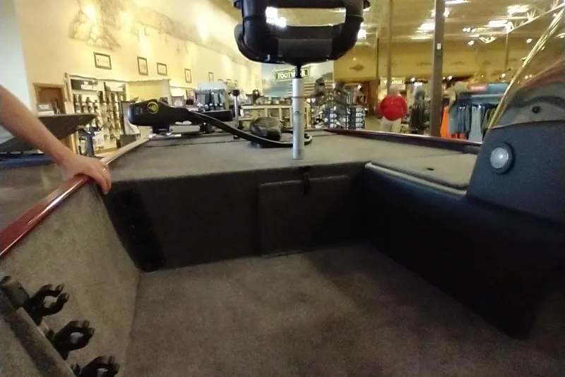 Slide: The Image of Interior view of 2026 Tracker Bass Tracker Classic XL boat in showroom. - 8