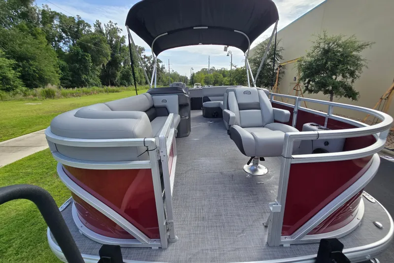 Slide: The Image of 2026 Sun Tracker SportFish 20 DLX pontoon boat with spacious seating and canopy. - 53
