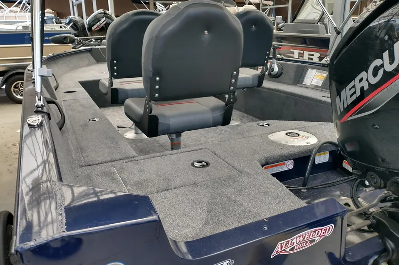 Slide: The Image of 2026 Tracker Super Guide V-16 SC boat with Mercury engine. - 2