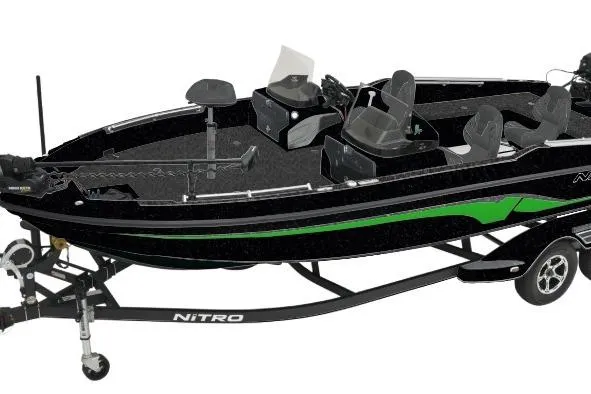 The Image of 2026 Nitro ZV21 Pro fishing boat with sleek black and green design on trailer. - 0