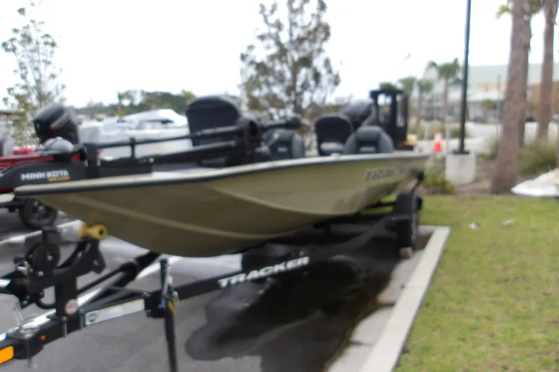 Slide: The Image of 2026 Tracker Pro Team 175 boat on trailer in parking lot. - 14