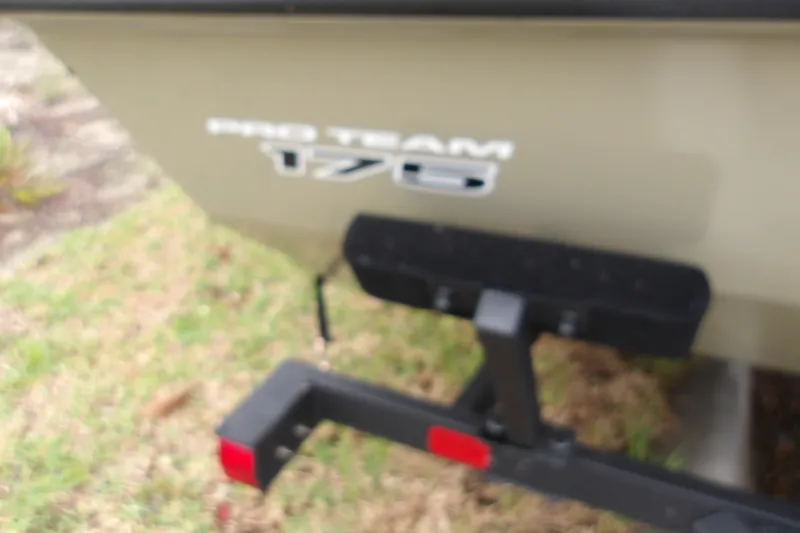 Slide: The Image of 2026 Tracker Pro Team 175 boat on trailer, side view with logo visible. - 16