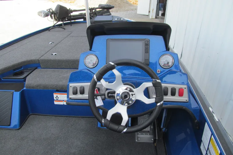 Slide: The Image of Steering console of a 2026 Nitro Z18 Pro boat with modern controls and display. - 97