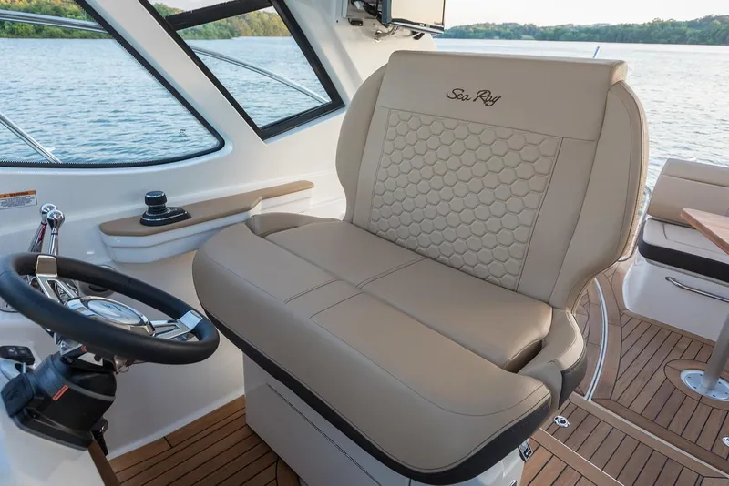 Slide: The Image of Manufacturer Provided Image: 2021 Sea Ray Sundancer 350 Coupe helm seat and steering wheel. - 15