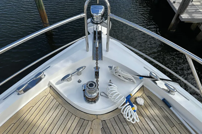 Slide: The Image of Bow of 2009 Lazzara LSX 75 yacht with anchor and ropes. - 13