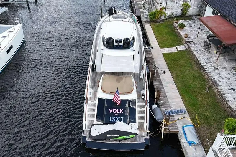 Slide: The Image of Aerial view of 2009 Lazzara LSX 75 yacht docked by waterfront property. - 2