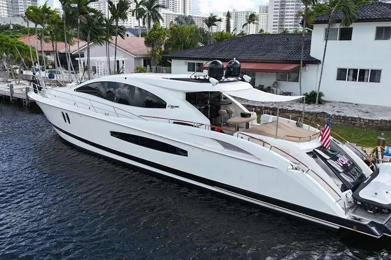Slide: The Image of Luxury 2009 Lazzara LSX 75 yacht docked by waterfront homes. - 6
