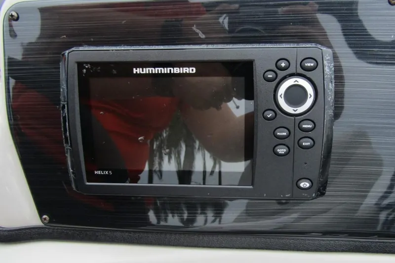 Slide: The Image of Humminbird Helix 5 fish finder on 2022 Starcraft SLS 5 boat dashboard. - 13