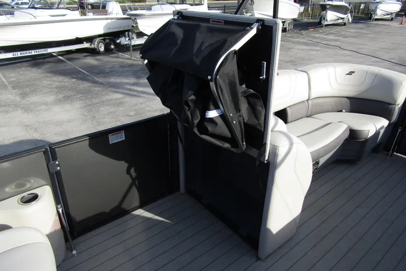 Slide: The Image of 2022 Starcraft SLS 5 boat interior with seating and storage compartment. - 18