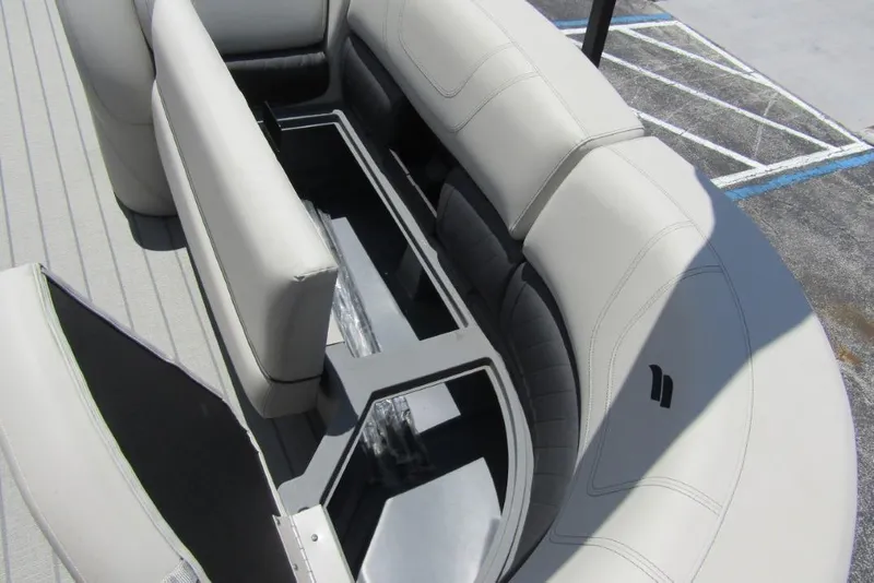 Slide: The Image of 2022 Starcraft SLS 5 boat interior with spacious seating and storage compartment. - 8