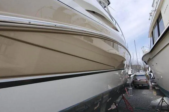 Slide: The Image of 2008 Cruisers Yachts 360 Express, side view, docked in a marina. - 2