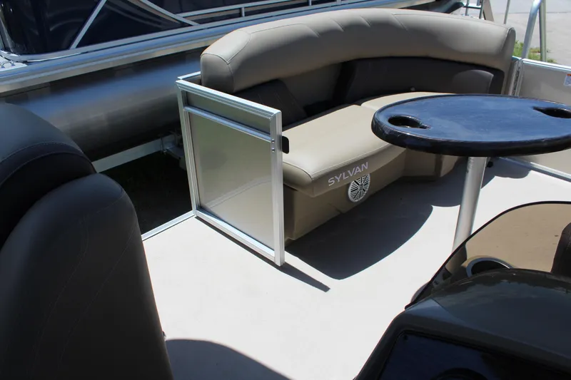 Slide: The Image of 2026 Sylvan Mirage 820 PARTY FISH pontoon interior with seating and table. - 12