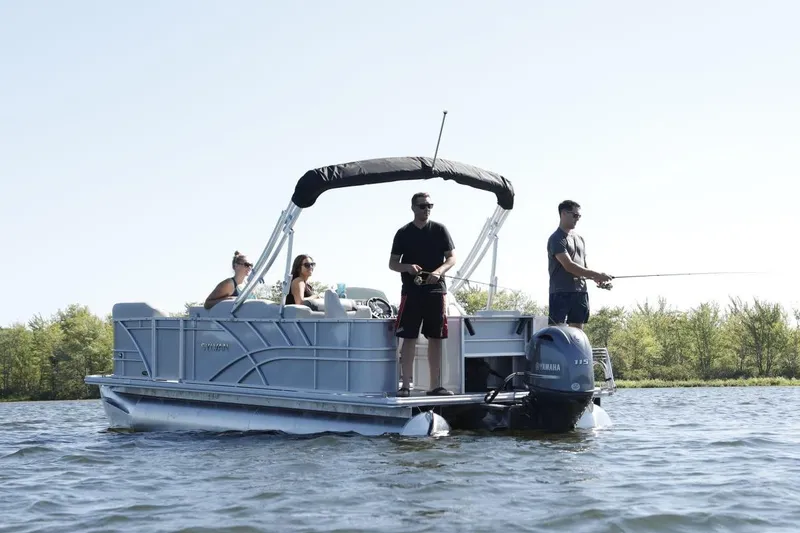 Slide: The Image of 2026 Sylvan Mirage 820 PARTY FISH pontoon boat with people fishing on a lake. - 16