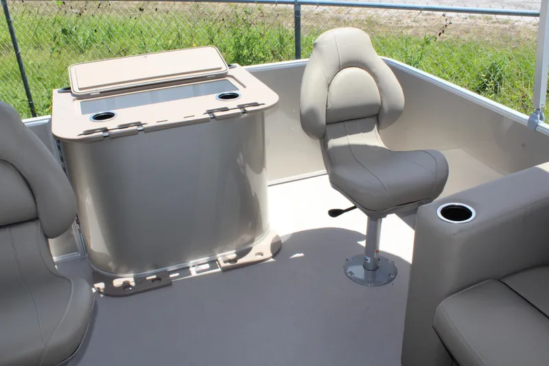 Slide: The Image of 2026 Sylvan Mirage 820 PARTY FISH boat interior with seating and storage. - 4