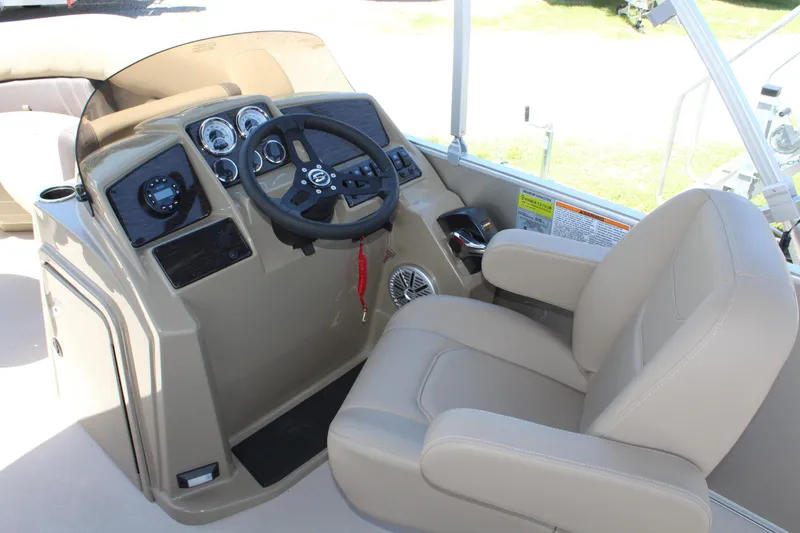 Slide: The Image of 2026 Sylvan Mirage 820 PARTY FISH boat helm with steering wheel and controls. - 7