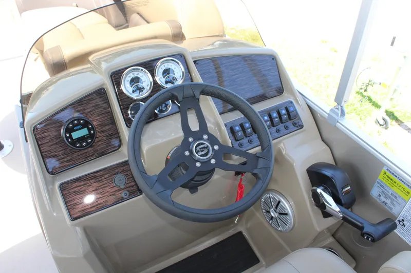 Slide: The Image of Steering console of 2026 Sylvan Mirage 820 PARTY FISH with modern controls and gauges. - 8