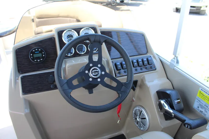 Slide: The Image of Steering console of 2026 Sylvan Mirage 820 PARTY FISH boat with modern controls. - 9